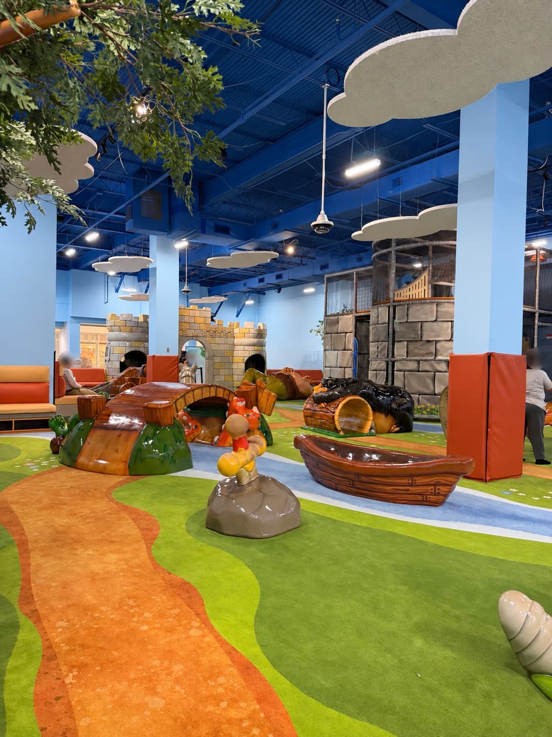 View across the medieval soft-play area with hanging Tectum® clouds overhead